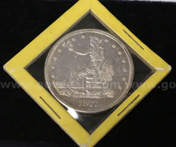 1877-S U.S. Silver Trade Dollar, Graded Almost Uncirculated