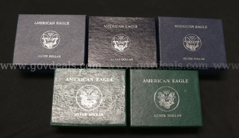 5 Assorted Date Uncirculated U.S. Silver American Eagle $1 Coins