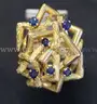18K Yellow Gold Interlocking Design Ring With Blue Sapphires, 15.8 Grams