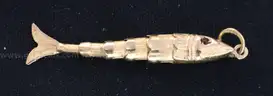 18K Yellow Gold Articulated Fish Design Pendant With Red Stones, 1.5 Grams