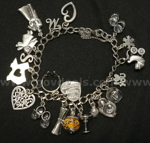James Avery Sterling Silver Charm Bracelet With 20 Assorted Charms, 59.8 Grams