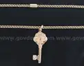 10K Yellow Gold Double Curb Necklace and Key Design Pendant, 14.1 Grams