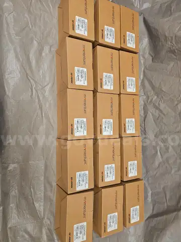 Fifteen Harris Momentum UHF Two Way Radios in the Box