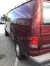 Ford E250 cargo van with ladder rack