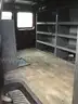 Ford E250 cargo van with ladder rack