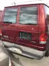Ford E250 cargo van with ladder rack