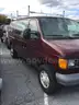 Ford E250 cargo van with ladder rack