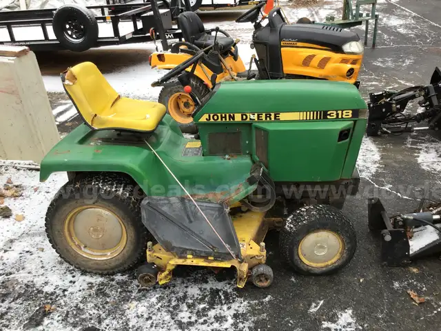John Deere 318 W/ Blade Attachment