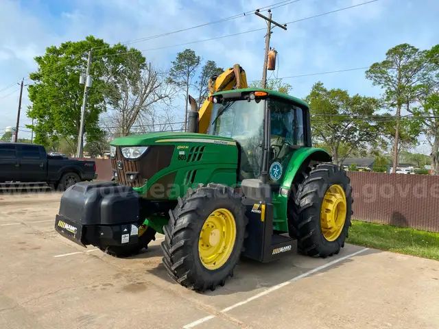 2015 John Deere 6140M with 30ft Maverick Alamo Boom Attachment