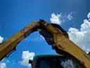 2015 John Deere 6140M with Alamo Boom Attachment