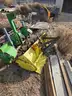 Yellow John Deere Rototiller