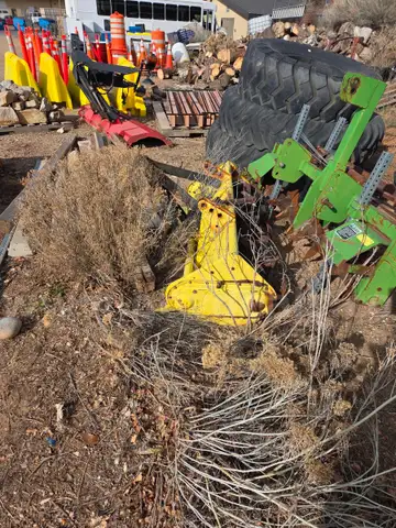 Yellow John Deere Rototiller