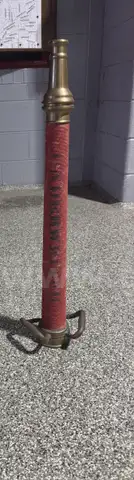 Fire Nozzle;  (1) 28"  One marked Underwriters. "Playpipes" Brass/corded Nozzle