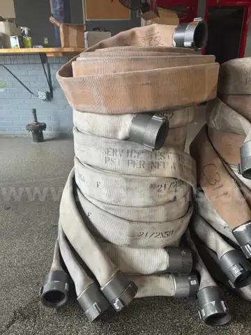 Fire hoses (7), 2.5" x 50' rolls.