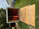 2012 Homesteader Covered Trailer