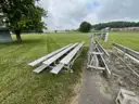 2 Aluminum Bleachers and 2 Aluminum Benches