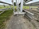 2 Aluminum Bleachers and 2 Aluminum Benches