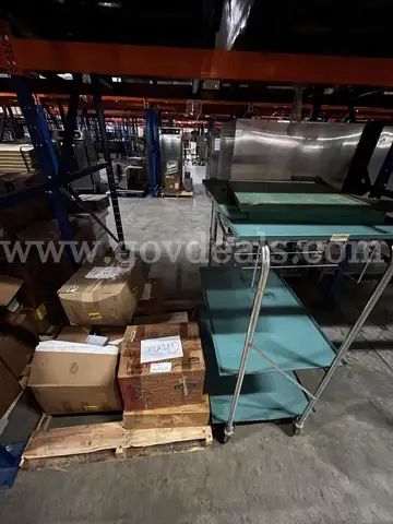 BOXES OF MISC. LIBRARY DISCARD BOOKS AND ROLLING CART