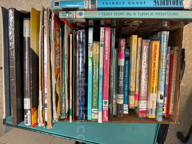 12 boxes of middle schools library discards