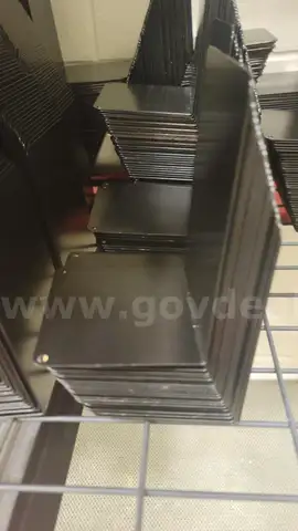 Large Lot (1260 pieces) of Black Metal Bookends with rough cork bottoms