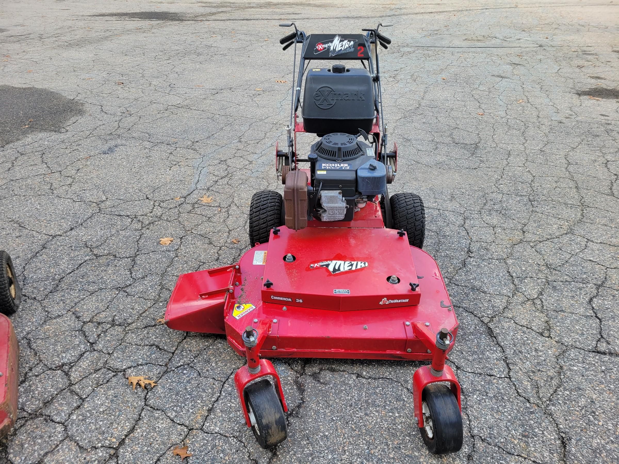 Exmark ride behind online mower