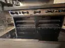 American Range 10 burner stove with double oven