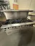 American Range 10 burner stove with double oven