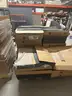 Two pallets of carpe tile of different colors