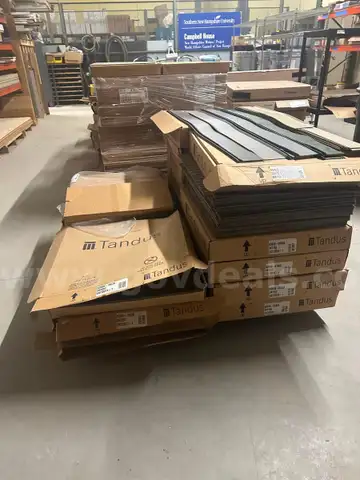 Two pallets of carpe tile of different colors