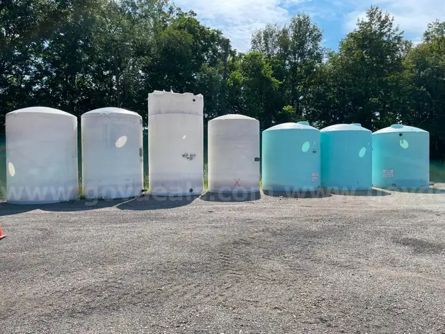 Lot of (7) Large Liquid Storage Tanks