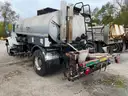 1999 International 4700 with Tank Body / Tack Truck