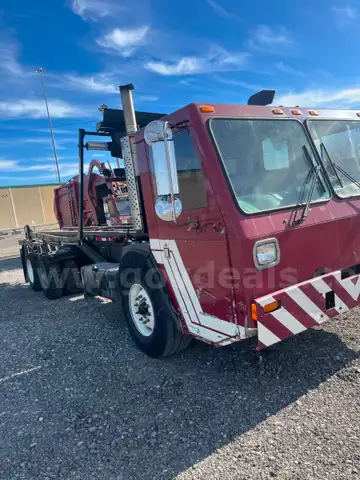 2002 Crane Carrier Co. Low Entry