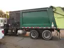 2015 PETERBILT 320- AUTOMATIC TRASH PICKUP