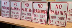 7 Pack Aluminum Road Signs ** NO PARKING THIS SIDE OF STREET **