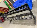 Assortment of paired Dumbbells and rack