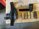 Multi-tools, pocket knife and pistol holster
