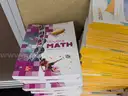 Lot of miscellaneous school aged textbooks and student workbooks