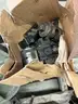 small pallet of used machining tooling