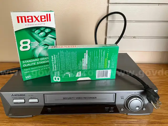 Mitsubishi security video recorder with 2 VHS tapes