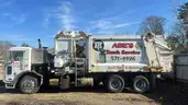 2013 Peterbilt 320 Side Load Garbage Truck