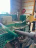 Cummins 100 kW standby generator powered by a Ford 6.8L V10 gas engine.