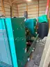 Cummins 100 kW standby generator powered by a Ford 6.8L V10 gas engine.