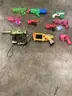 Lot of misc box items-two red XShot toy guns, yellow Nerf toy gun, 3 pink plastic toy guns, green &#x26; white X toy gun &#x22;DH&#x22;