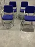 4 dark blue chairs, with steel silver armrests  &#x22;DH&#x22;