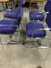 4 dark blue chairs, with steel silver armrests  &#x22;DH&#x22;