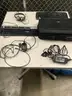 Lot of misc box items-17 inch HP laptop bag, HP, &#x26; Logitech keyboards, 2 HP adapters, office headset, &#x22;DH&#x22;
