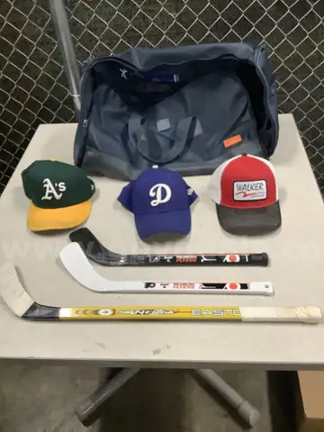 Lot of misc box items-2 Philadelphia Flyers hockey sticks, 7 1/2 A&#x27;s hat, small/medium D hat, Walker hat-no size, &#x22;DH&#x22;