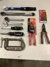 Lot of misc box items-2 torque wrenches, 2 crescent cutters, 2 Husky screwdrivers, 4 inch steel clamp, 7 drill bits,  DH