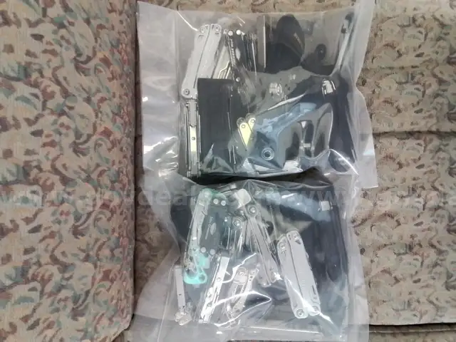 1 Lot of Leatherman Multi-Tools, Knives
