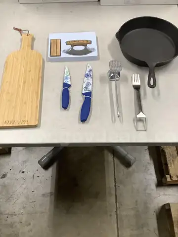 Lot of misc box items-17 1/2 inch Sterling cutting board, 11 inch frying pan, Alaskan knife, silver meat tenderizer,  DH